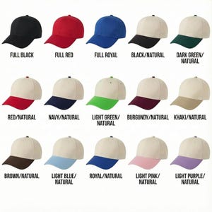 May include: A collection of baseball caps in various colors, including full black, red, and royal blue. Other caps feature a natural-colored crown with colored brims in shades like dark green, burgundy, and light purple. Each cap is labeled with its color combination.