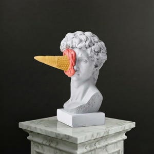 May include: A set of three ceramic mugs with a speckled, matte finish in cream, light grey, and dark grey. Each mug has a minimalist design, ideal for tea or coffee.