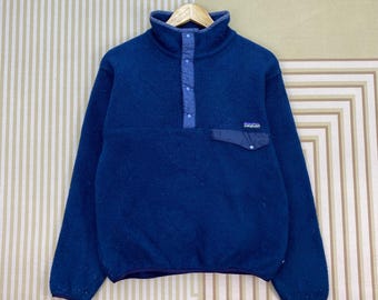 Chaqueta tipo jersey de forro polar Patagonia estilo vintage de los años 90 con medio botón.