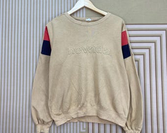Sudadera de cuello redondo bordada de Nevada