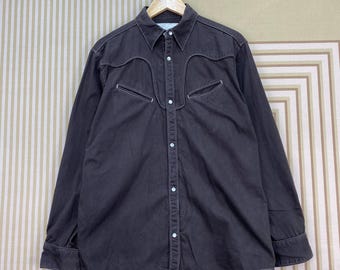 Chaqueta estilo western Caravach con botones a presión.