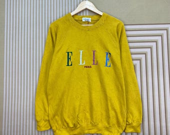 Sudadera vintage de ELLE Paris con logo bordado multicolor.