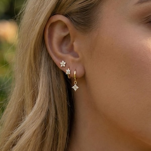 May include: A rustic wooden sign with the text "Welcome to our home" in white lettering. The sign has a distressed finish and a simple, inviting design, ideal for entryway decor.