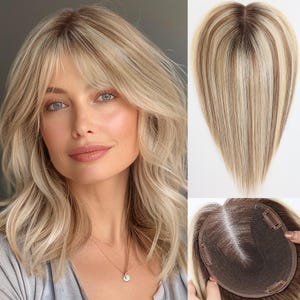 May include: A woman with wavy blonde hair and bangs. A hair topper with blonde and light brown highlights is shown. The hair topper has a brown base with clips for attachment. The hair is styled to appear natural and voluminous.