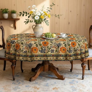 May include: A set of three ceramic canisters with lids, featuring a geometric pattern in shades of blue, white, and gray. The canisters vary in size, with the largest approximately 8 inches tall.