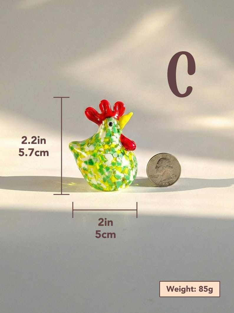May include: A colorful glass rooster figurine, 2.2 inches tall and 2 inches wide, with red comb and wattle, yellow beak, and a body speckled with green and yellow. The figurine weighs 85g.