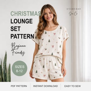 May include: A two-piece lounge set pattern featuring a short-sleeved top and shorts in an off-white fabric with a repeating print of green Christmas trees, red bows, holly berries, and gold stars. Text includes CHRISTMAS LOUNGE SET PATTERN.