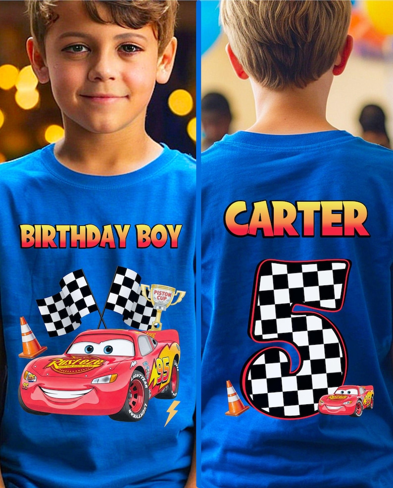May include: Blue t-shirt with a graphic of Lightning McQueen from the movie Cars. The front of the shirt says "BIRTHDAY BOY" and features race flags, a trophy, and a lightning bolt. The back of the shirt says "CARTER" and "5" with a checkered pattern.