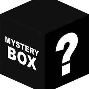 May include: A black cube-shaped box with the words "MYSTERY BOX" in white, bold, capital letters. A large white question mark is on the right side of the box. The box is angled, giving a three-dimensional appearance.