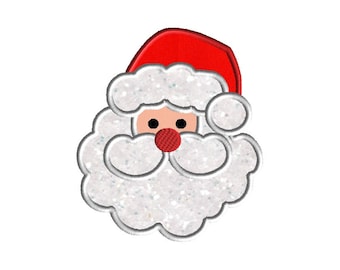 May include: An embroidered patch of a Santa Claus head featuring a bright red hat, a peach-colored face with two black circular eyes, a small red nose, and a thick, textured white beard and mustache with a subtle glittery finish.