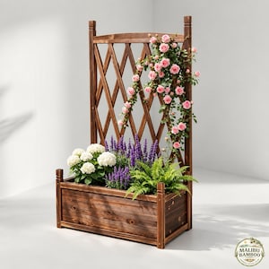 May include: A rectangular dark brown wooden planter box with a tall diamond-patterned trellis back. The planter contains white hydrangea flowers, purple lavender stalks, green ferns, and a climbing vine with pink roses attached to the trellis.