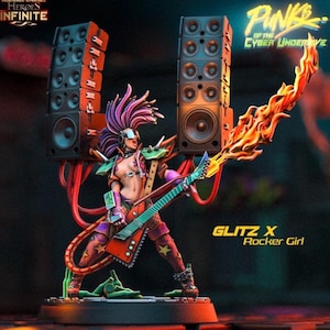 May include: A detailed miniature figurine of a rocker girl with purple hair, playing a guitar with flame effects. The figure is set against a backdrop of speaker stacks and the text "GLITZ X Rocker Girl".