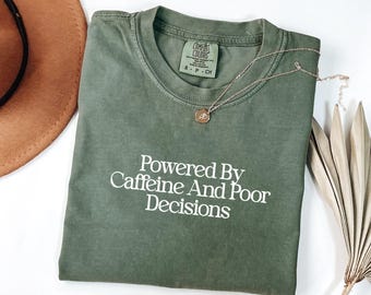 Comfort Colors® Powered By Caffeine And Poor Decisions Shirt | Funny Coffee Lover Shirt | Caffeine Lover Gift | Retro Typography Shirt