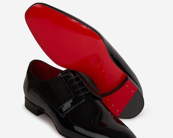 Scarpe da uomo Christian Louboutin in pelle verniciata nera.