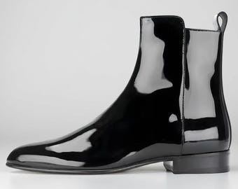 hristion Louboution Stivaletti alti in pelle verniciata nera: stivali eleganti unisex con cerniera laterale