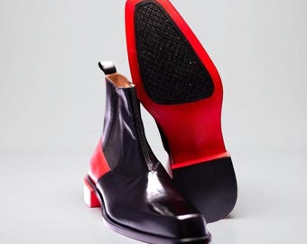 Botines Chelsea estilo vaquero de piel auténtica de Christian Louboutin con punta cuadrada y tacón de aguja.