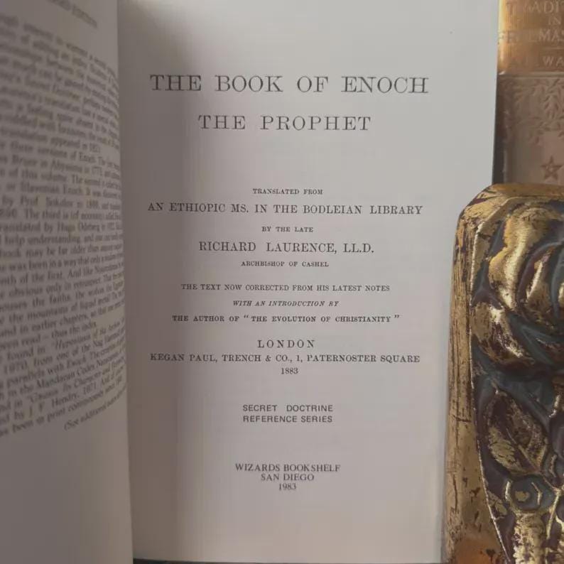 May include: Open book titled "The Book of Enoch The Prophet" with text translated from an Ethiopic manuscript. Published by Kegan Paul, Trench & Co. in London, 1883. Includes "Secret Doctrine Reference Series" and "Wizards Bookshelf, San Diego 1983".