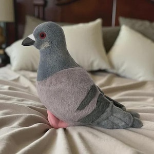 May include: A handmade wooden sign with the text "Welcome" in a playful font. The sign features a distressed white background and a dark brown border, perfect for a front door or entryway. The sign measures approximately 12 inches wide and 6 inches tall.