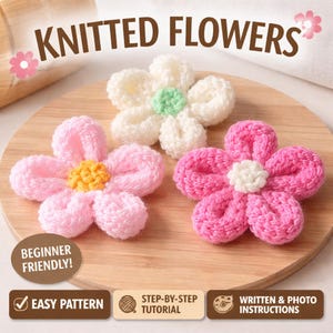 May include: Three knitted flower decorations in pink, white, and fuchsia, each with a different colored center, are displayed on a wooden surface. The image includes text that reads "KNITTED FLOWERS", "BEGINNER FRIENDLY!", "EASY PATTERN", "STEP-BY-STEP TUTORIAL", and "WRITTEN & PHOTO INSTRUCTIONS".
