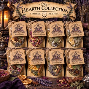 May include: Eight clear pouches of dried botanical simmer pot blends, each with a brown paper tag labeled The Hearth Collection. Varieties include Hearthkeeper, Hearthside Affection, Hearth Circle, Banishing Pot, Scrying Pot, Golden Hearth, Grounded Hearth, and Hearth of Plenty, featuring dried citrus, herbs, and spices.