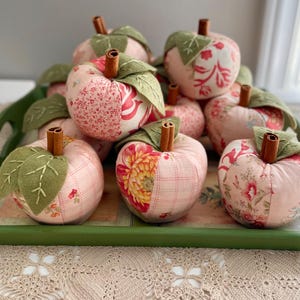 New romantic patchwork apple fabrics available.