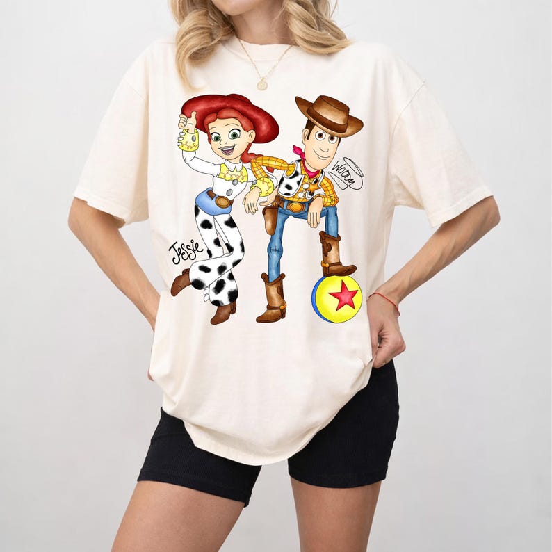 May include: A white ceramic mug with a black handle and the text "But First, Coffee" in a black, bold font. The mug is on a white surface.