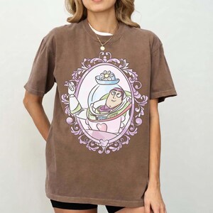 Buzz Lightyear Retro Comfort Colors Shirt, Disney Toy Story Girl Trip Tee, Mrs. Nesbitt’s Tea House Shirt, To Infinity and Beyond Magic Tee image 3