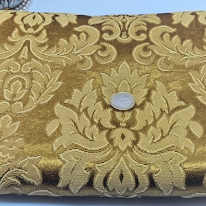 May include: A set of three ceramic mugs with a speckled, matte finish. The mugs are in shades of cream, light gray, and dark gray. Each mug has a simple, minimalist design, perfect for coffee or tea.