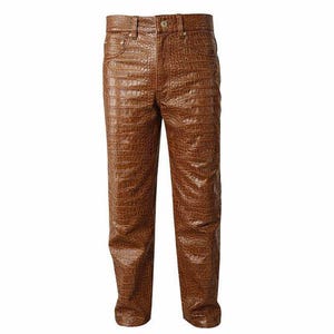 May include: Brown faux leather trousers with a crocodile skin texture. The trousers have a classic five-pocket design, a button and zip closure, and belt loops. The trousers are a medium brown colour.