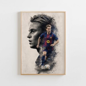 May include: Framed art print depicting a footballer in a blue and red kit, controlling a football. A grayscale portrait of the player is in the background. The artwork has a watercolour effect with a light beige backdrop.