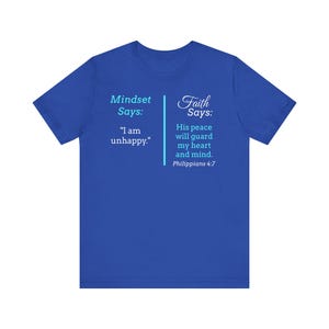 The image is a blue t-shirt with text and a Bible verse from Philippians 4:7.