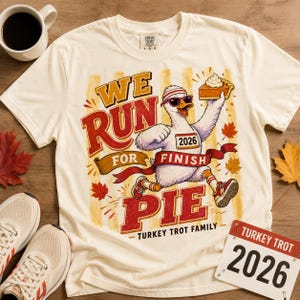 Turkey Trot Family 2026 PNG with funny running turkey holding pumpkin pie, retro red and orange lettering and fall accents, designed for matching family Thanksgiving 5K and Turkey Trot crew shirts.