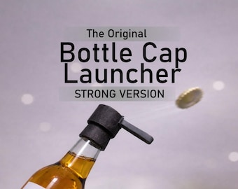 Lanciatore di tappi di bottiglia / Spara tappi di bottiglia *L'originale*