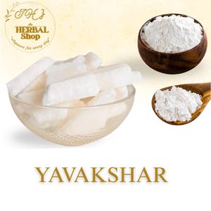 May include: Image of Yavakshar, a white herbal product, displayed in a clear glass bowl, a wooden bowl, and a wooden spoon. The text "YAVAKSHAR" is displayed in gold lettering.