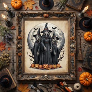 May include: A framed Halloween-themed artwork featuring three witches in black cloaks and hats, standing before a full moon. The artwork is surrounded by pumpkins, candles, and other seasonal decorations, creating a spooky and festive atmosphere.