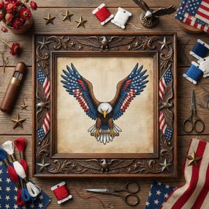 May include: A framed cross-stitch of an eagle with outstretched wings, featuring red, white, and blue colors. The frame is brown with star and eagle details. The image is surrounded by sewing supplies, including spools of thread, scissors, and star-shaped ornaments.