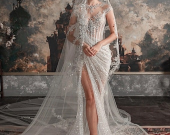 Custom dresses ( two dresses, veils and separate skirts)