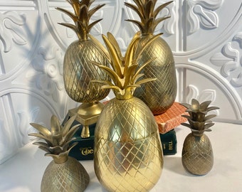 Brass pineapple, collection, vintage brass, hospitality, tabletop decor, candle holders, pineapple box, gold tone, grouping