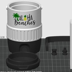 May include: A white and black cylindrical container with a textured upper band and a black base. The front features a green palm tree, a yellow pineapple, and the black text Aloha Beaches. Included are a separate black lid, two small black connectors, and a rectangular block with vertical white, yellow, green, and black stripes.
