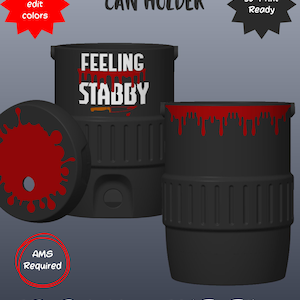 May include: A black 12oz standard can holder 3D print file with a red blood splatter design on the lid and top rim. The front features the white text 'FEELING STABBY' with a small knife graphic. Includes text 'Easy to edit colors', '3D Print Ready', 'AMS Required', and '3D Printing 3MF Files'.