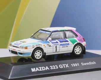 Vintage Model Cm's 1/64 Rally Car Collection SS.15 Mazda 323 Familia GTX 1991 No.1 Swedish WRC