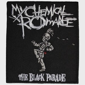 May include: A rectangular black embroidered patch featuring the white text My Chemical Romance at the top and The Black Parade at the bottom. In the centre, a white skeleton figure in a marching band uniform is depicted with a small red accent.