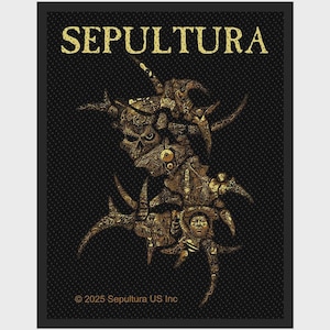 May include: A rectangular black fabric patch featuring the gold text SEPULTURA at the top. The center displays a complex, textured gold graphic of intertwined organic shapes, skulls, and faces. The bottom includes the text 2025 Sepultura US Inc.