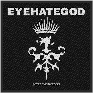 May include: A square black fabric patch featuring the white text EYEHATEGOD at the top, a white crown icon above a white ornate heraldic symbol in the center, and the white text 2023 EYEHATEGOD at the bottom of the design.