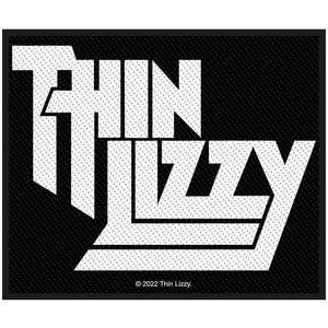 May include: Black and white patch featuring the band name "Thin Lizzy" in a stylized font. The patch has a rectangular shape and includes the copyright information "© 2022 Thin Lizzy."
