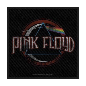 May include: Black square patch featuring the Pink Floyd logo. The design includes a prism refracting light into a rainbow, with the band's name in distressed lettering. The text "Dark Side of the Moon" is also present.