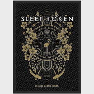 May include: A rectangular black poster with a gold-colored graphic featuring the text SLEEP TOKEN at the top and 2025 Sleep Token at the bottom. The design includes a central flamingo silhouette, circular geometric lines, floral branches, and two curved blades.