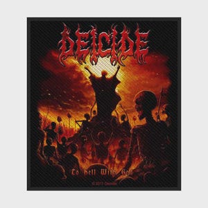 May include: A rectangular fabric patch featuring a dark, fiery scene with a central figure standing with arms raised. The text DEICIDE appears in red at the top, and To Hell With God is printed in a gothic font at the bottom, dated 2011.
