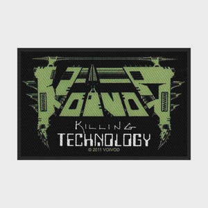 Puede incluir: Un parche rectangular de tela negra con un diseño gráfico estilizado en verde claro con el texto VOIVOD en la parte superior. Debajo del gráfico, el texto dice KILLING TECHNOLOGY y 2011 VOIVOD en letras blancas, cuadradas y desgastadas.