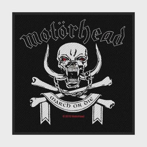 May include: A square black fabric patch featuring the white text Motörhead above a central skull graphic with red eyes, curved horns, and a chain. Below the skull, a white banner displays the text March or Die with 2010 Motörhead in red.